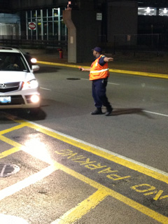 The Unsung Orange-Vested Airport Superhero photo